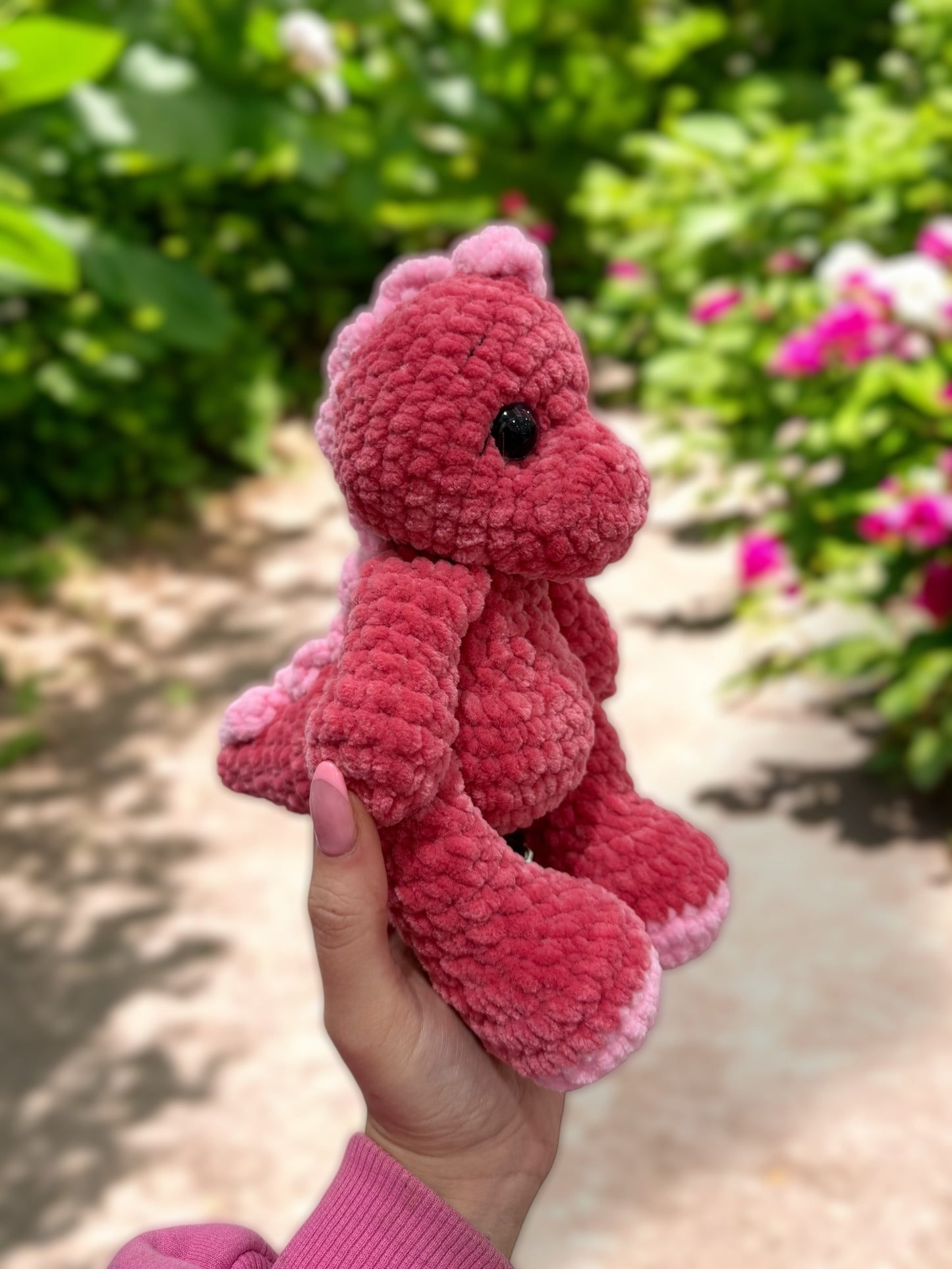Pink dinosaur side view