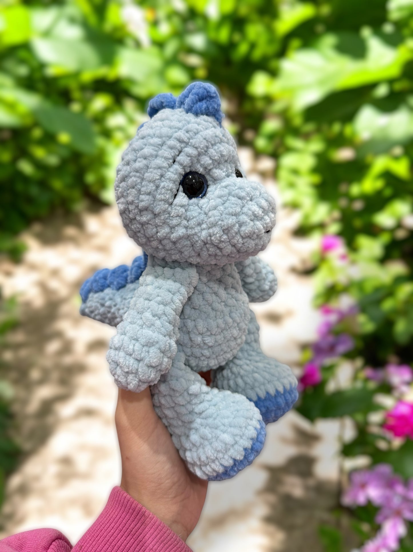 Blue dinosaur side view
