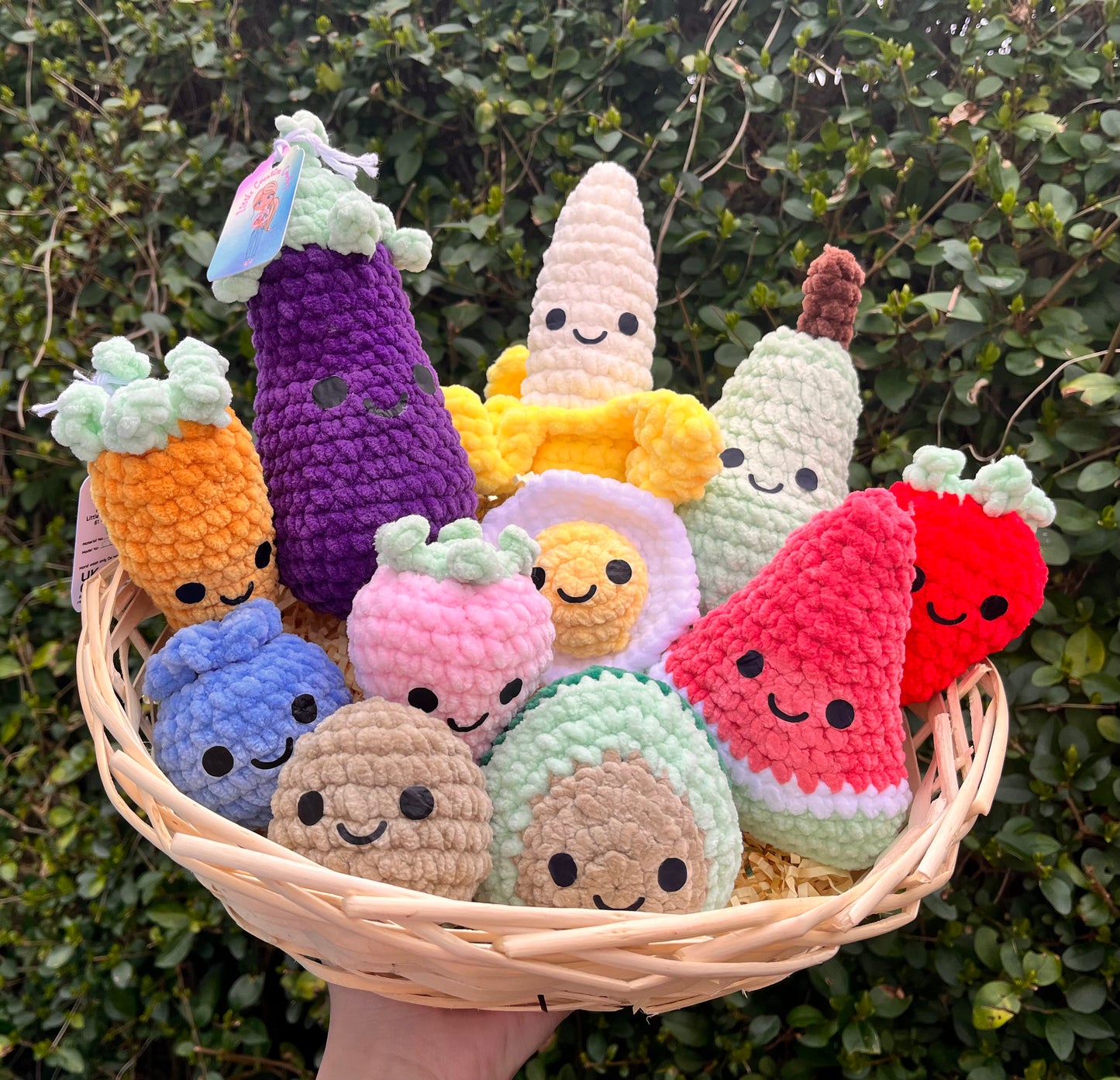 A basket of crochet fruit and vegetables
